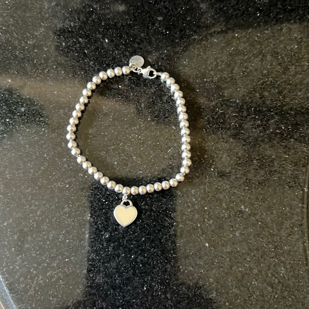 Heart tag 4mm Tiffany 7 inch bracelet.